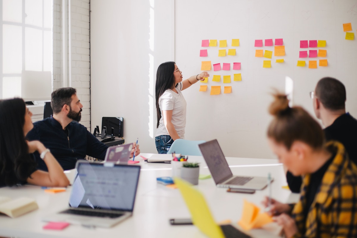 Cross-functional team workshop aligning product and messaging